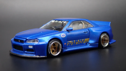 Машинка Premium MINI GT Nissan Skyline GT-R (R34) Kaido Works Shinjuku V2 1:64 KHMG158 Blue Машинка Premium MINI GT Nissan Skyline GT-R (R34) Kaido Works Shinjuku V2 1:64 KHMG158 Blue - Retromagaz, image 1