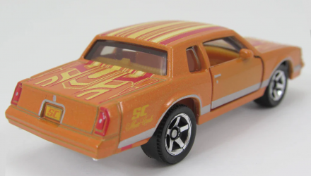 Тематична Машинка Matchbox 1988 Chevy Monte Carlo LS Super Chase Moving Parts 1:64 JBX04 Orange - Retromagaz, image 2