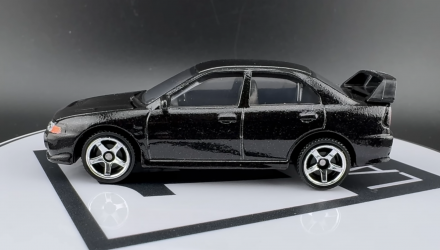 Тематическая Машинка Matchbox 1996 Mitsubishi Lancer Evolution IV Moving Parts 1:64 FWD28/HVM98 Black - Retromagaz, image 4