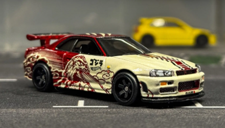 Машинка Premium Hot Wheels Nissan Godzilla Nissan Skyline GT-R (BNR34) Pop Culture 1:64 JHW90 White - Retromagaz, image 1