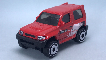 Машинка Базова Hot Wheels Mitsubishi Pajero Evolution Mud Studs 1:64 HKG47 Red - Retromagaz, image 2