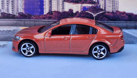 Машинка Велике Місто Matchbox Holden VF Commodore SSV Highway 1:64 HVN64 Orange - Retromagaz, image 1