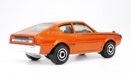 Тематична Машинка Matchbox 1975 Mitsubishi Lancer Celeste Moving Parts 1:64 JBX01 Orange image_2 Тематична Машинка Matchbox 1975 Mitsubishi Lancer Celeste Moving Parts 1:64 JBX01 Orange - Retromagaz, image 2