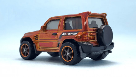 Машинка Базова Hot Wheels Mitsubishi Pajero Evolution Super Treasure Hunt STH J-Imports 1:64 HTF38 Orange - Retromagaz, image 2